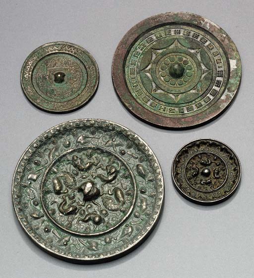 FOUR BRONZE MIRRORS