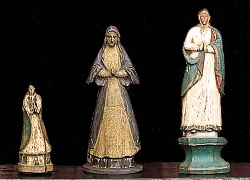 A GROUP OF FOUR SPANISH CARVED AND POLYCHROME-PAINTED FIGURES