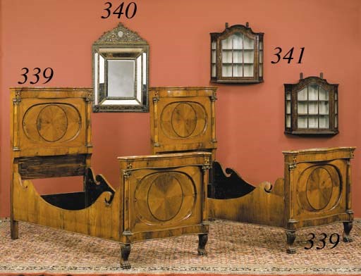 A PAIR OF DUTCH BAROQUE STYLE STAINED ELM HANGING-CABINETS