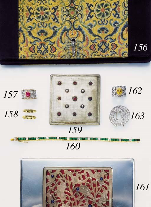 A DIAMOND, RUBY AND SILVER COMPACT, BY MARIO BUCCELLATI