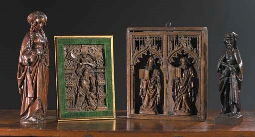 A carved oak figure of St. Elisabeth