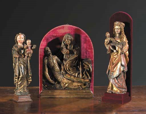 A polychrome carved wooden group of the Virgin and Child