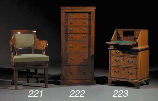 A walnut Wellington chest