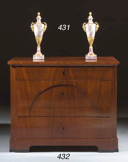 A German Biedermeier mahogany commode