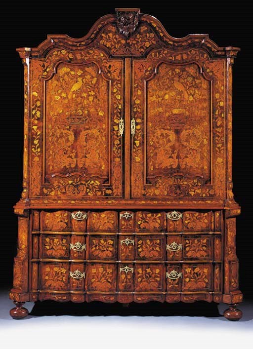 A Dutch walnut and marquetry cabinet
