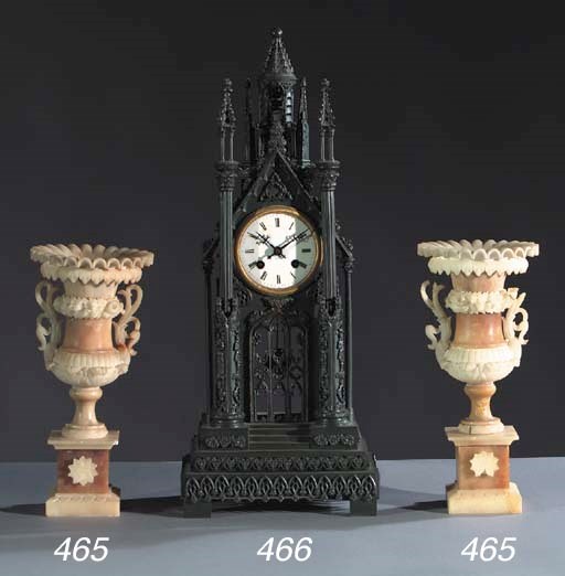 A pair of alabaster ornamental vases