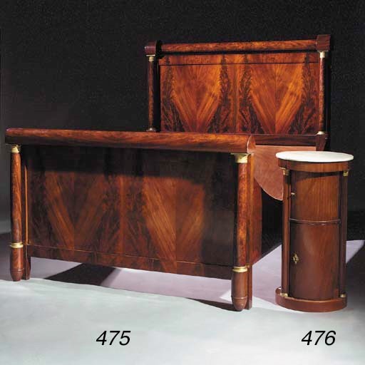 A pair of Empire mahogany bedside cabinets