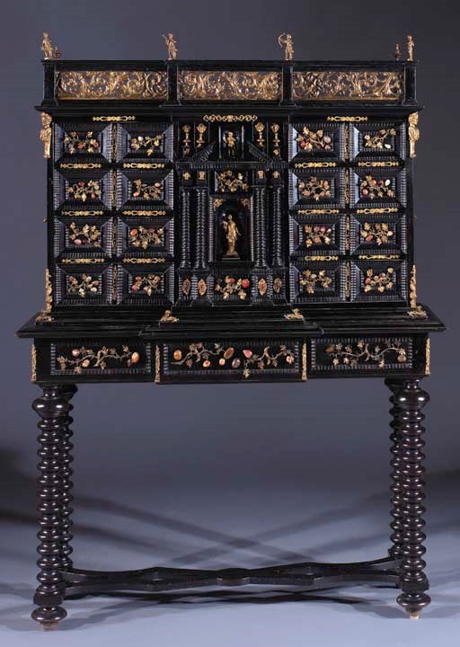 An Italian ebony and pietra-dura cabinet