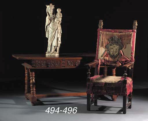 An Italian parcel-gilt walnut armchair