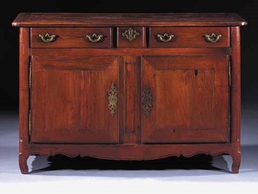 A French provincial walnut dresser