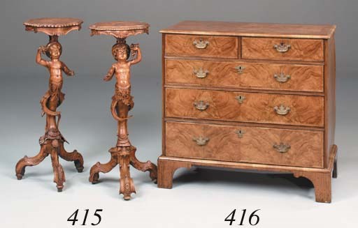 A pair of Italian fruitwood urn stands, 19th century