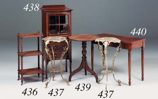 A Victorian three-tier fiddle-back walnut whatnot