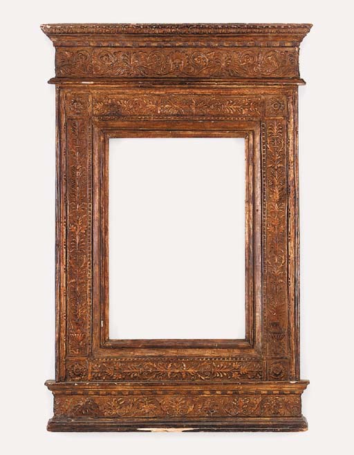 An Italian carved and gilded tabernacle frame, early 16th century