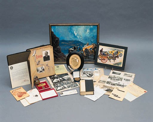 An early photograph depicting Mme Junek at the wheel of a Bugatti in a contemporary oval frame and mount; together with a presentation bronze medallion inscribed "ICSL Tourist Trophy, 20th June 1926"; and with a boxed presentation badge set from the Ministry of Sport Jubilee dated 1980.
