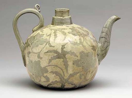 A Celadon and Reverse-Inlaid Stoneware Ewer