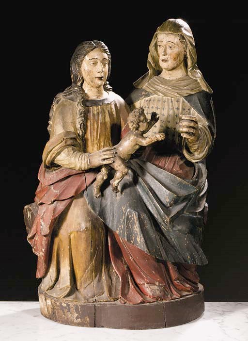 A parcel-gilt and polychrome carved wood group of Anna Selbdritt
