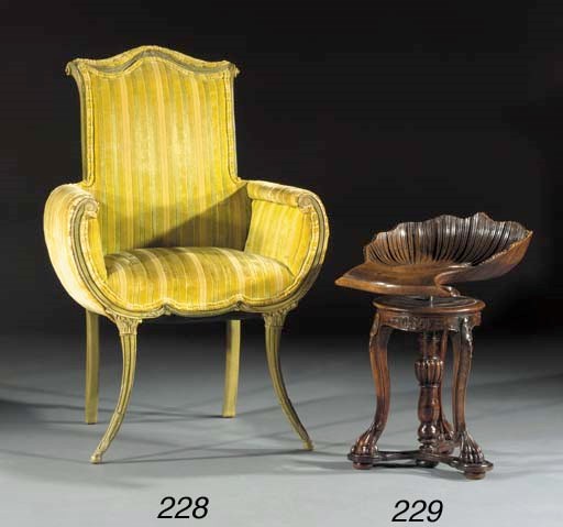 A mahogany piano stool