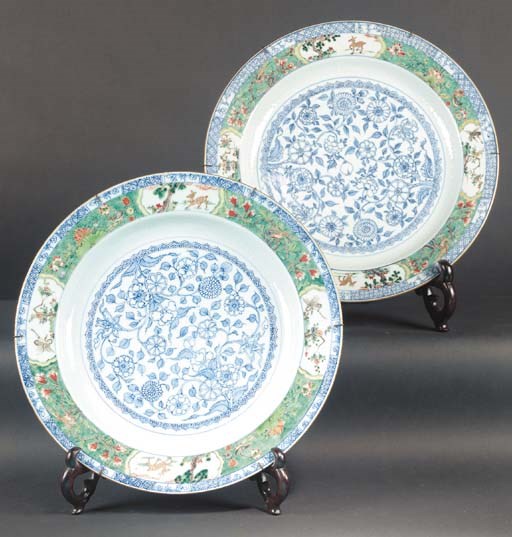 A pair of famille verte and underglaze blue chargers
Kangxi