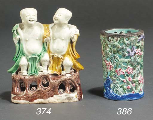 A famille verte biscuit model of the He He Erxian
Kangxi