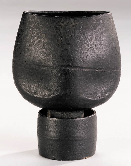 A Hans Coper burnished black stoneware cup form