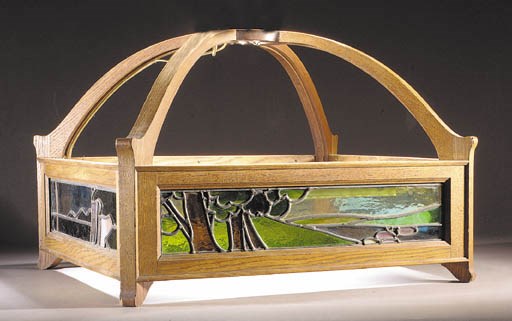 An Arts and Crafts hanging oak ceiling light