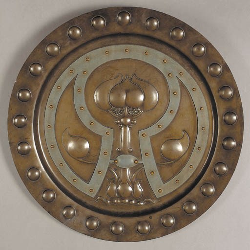 An Arts and Crafts copper charger