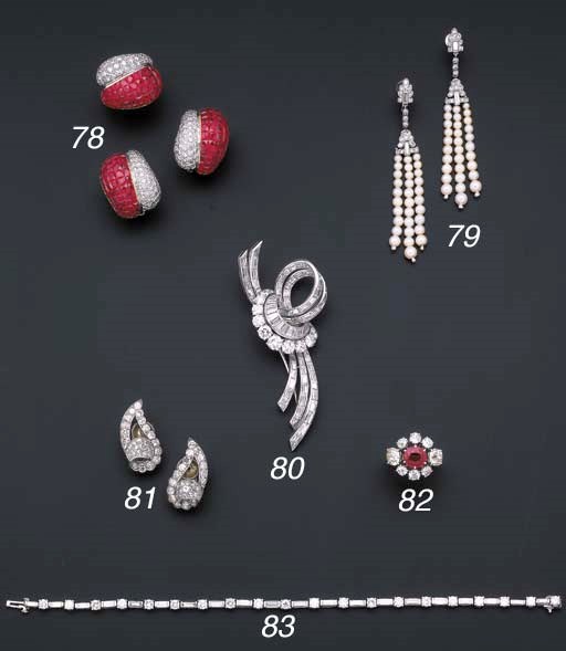 A pair of diamond ear clips