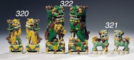 A pair of biscuit famille verte joss-stick holders