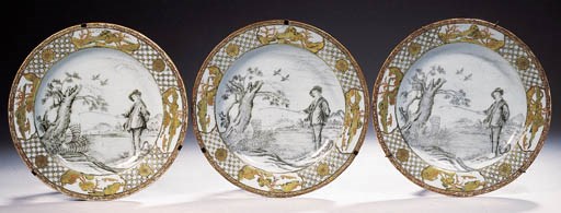 A set of three grisaille and gilt 'Le Pecheur' plates