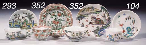 An assorted lot of polychrome cups and saucers