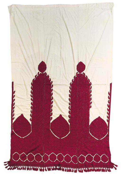 An embroidered curtain,