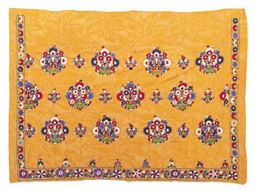An embroidered cover of yellow cotton damask,