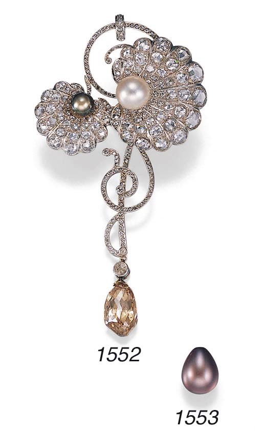 A FINE PURPLISH BROWN PEARL DROP