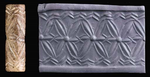 A SUMERIAN BROWN STONE CYLINDER SEAL