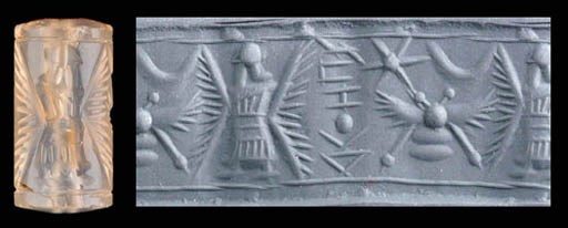 A WEST SEMITIC CHALCEDONY CYLINDER SEAL