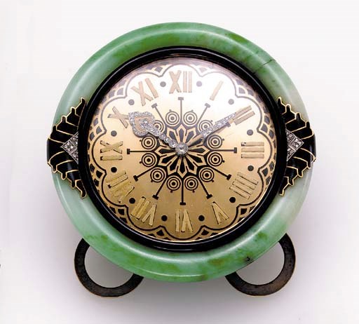 A brass, enamel, diamond-set and jadeite-style desk clock