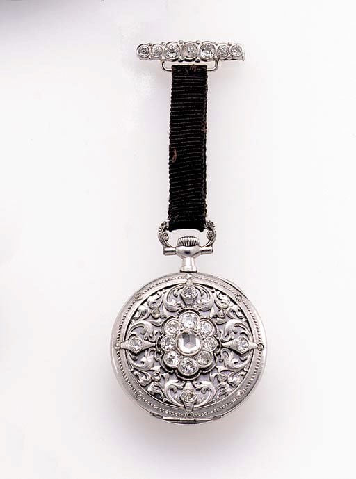 Vacheron & Constantin. An unusual platinum and diamond-set openface keyless lever lapel watch