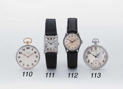 Swiss. A platinum rectangular wristwatch with two tone silvered dial