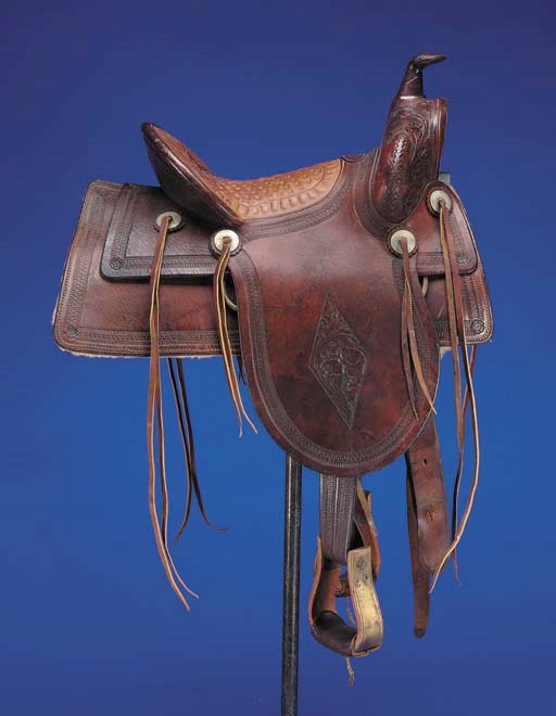 A FULL SEAT SADDLE BY TOM PADGITT CO., WACO, TEXAS, CIRCA 1910