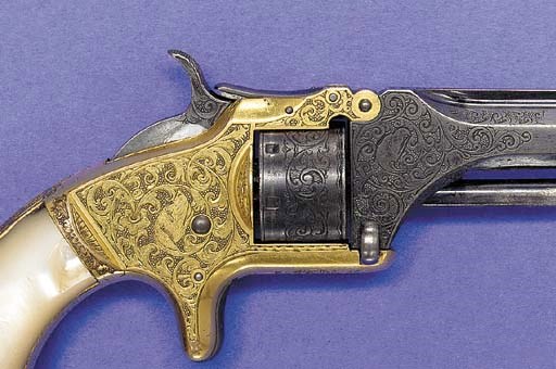 A RARE ELABORATE GUSTAVE YOUNG ENGRAVED AND INSCRIBED SMITH & WESSON MODEL 1 SECOND ISSUE REVOLVER, CIRCA 1860
