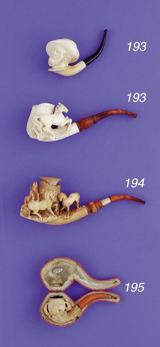 A LARGE CARVED MEERSCHAUM PIPE