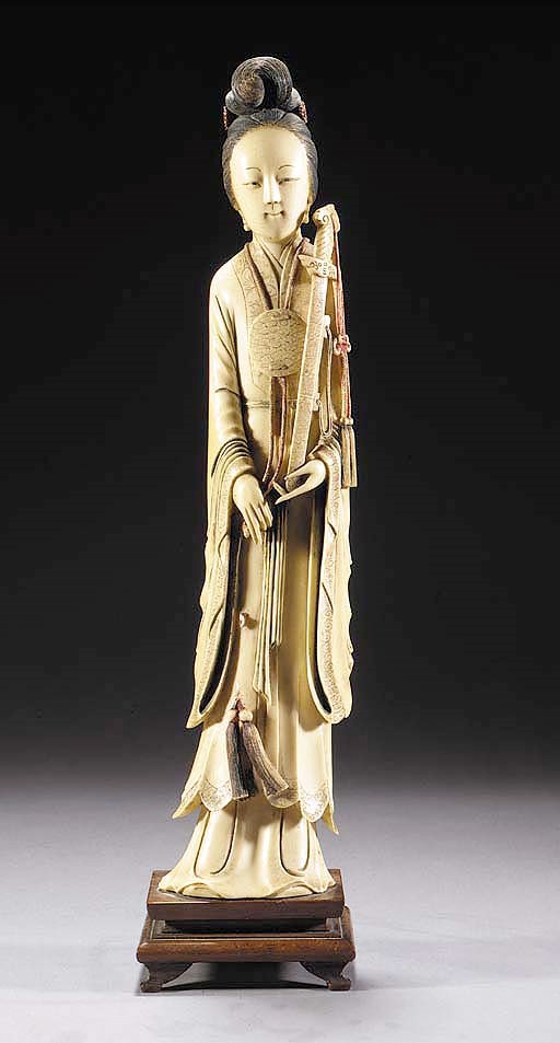 An ivory figure of a maiden
19th Century