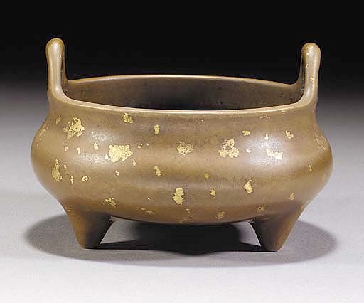 A bronze gold splash compressed tripod censer
17/18th Century