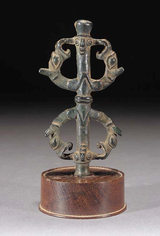 An Ordos bronze fitting
3/4th Century B.C.