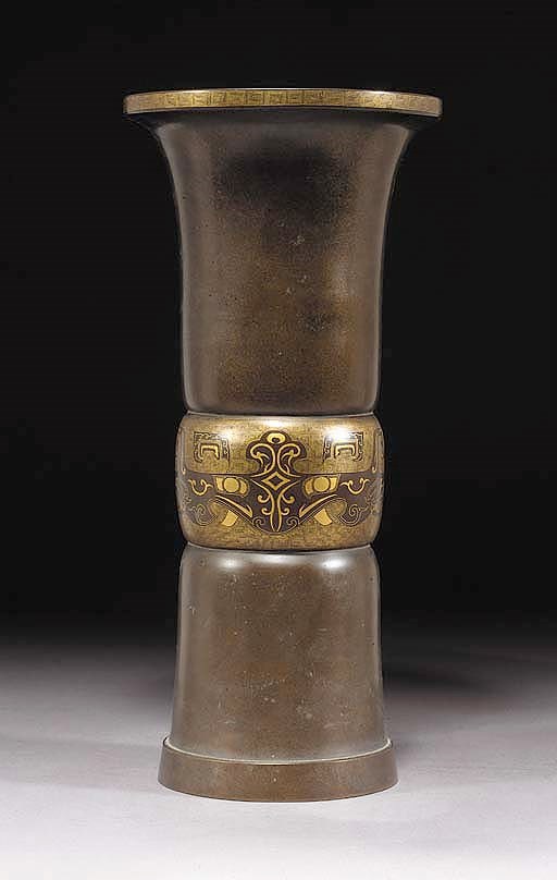 A gold inlaid bronze Gu-vase
19th Century