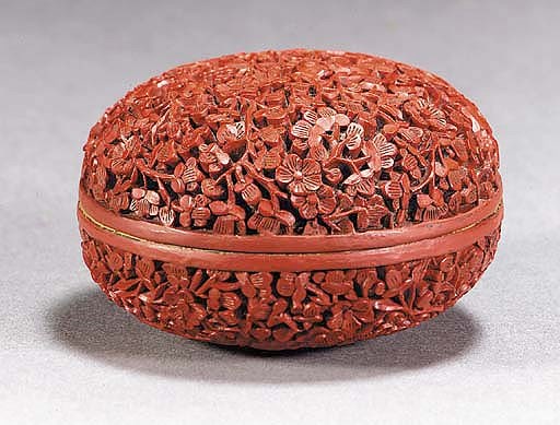 A small cinnabar lacquer box and cover
19th Century