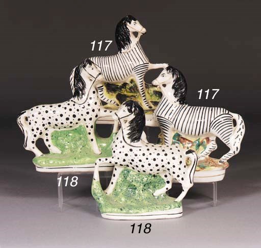 Two Staffordshire models of zebra