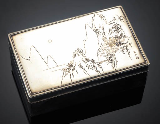 A silver and gilt mounted wooden rectangular box and fitted cover
Meiji Period