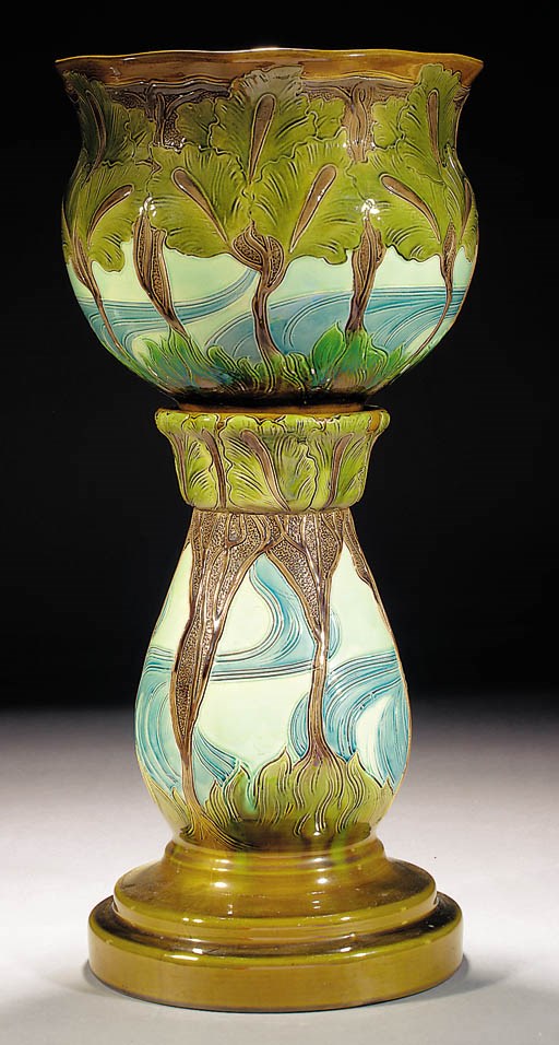 A Burmantofts jardiniere and stand