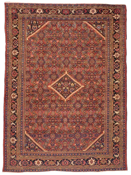 An antique Mahal carpet